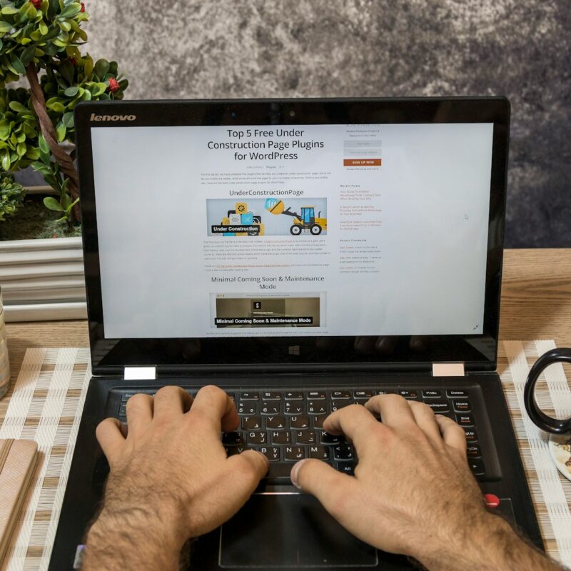 person using laptop computer